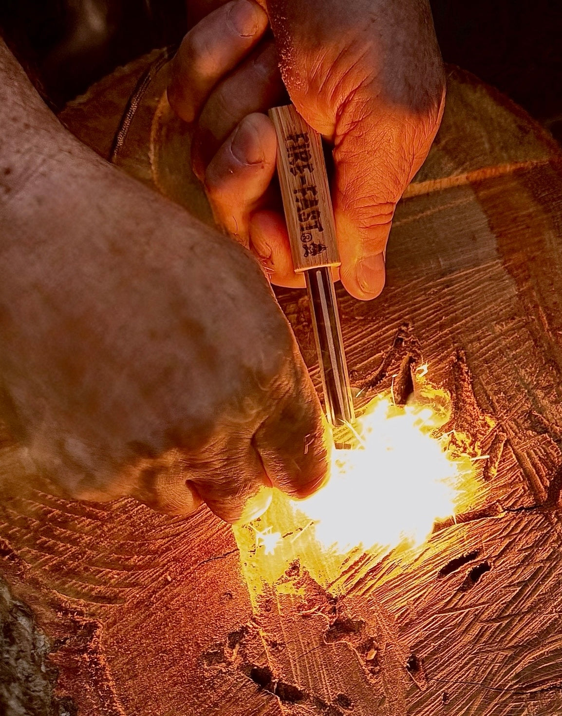 Limited-edition Firefly Mini survival fire starter: ultra-compact 1.5oz ferro rod with magnesium, tethered striker on paracord, and USA hardwood handle