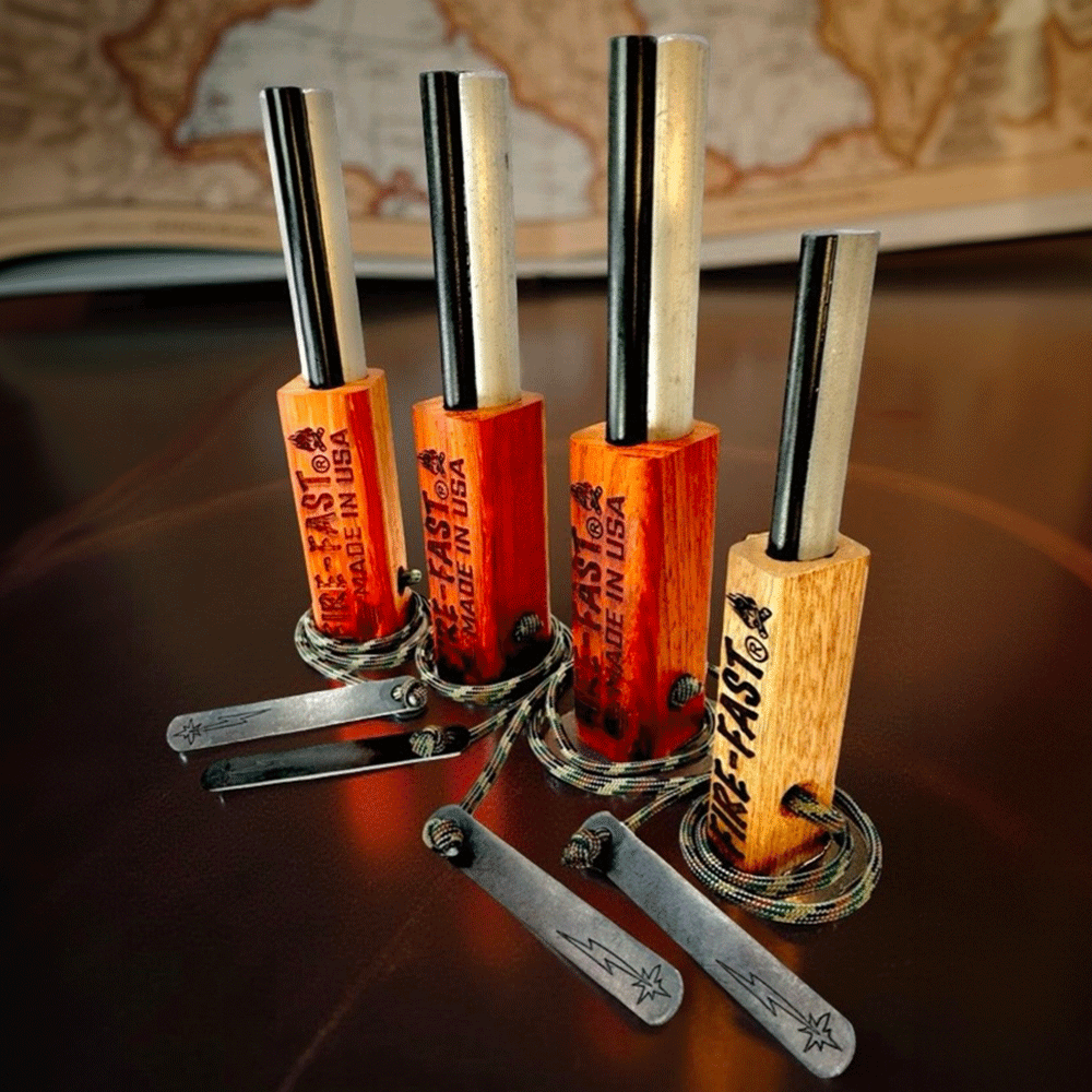 Fire-Fast MultiPak featuring three Trekker ferro rod fire starters in varying exotic hardwoods and one Firefly, each with 'FIRE-FAST MADE IN USA' engraving, hardened steel strikers, and paracord