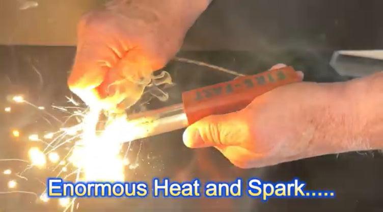 Hands demonstrating USA-made Fire-Fast Trekker waterproof fire starter scraping striker against ferrocerium rod to produce extreme heat and flame-thrower level sparks for reliable ignition in survival scenarios.